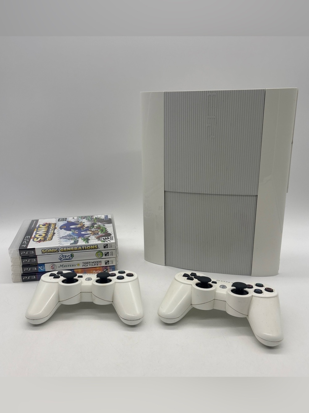 PlayStation 3 PS3 Super Slim White 500GB CECH-4001C w/ 4 Games & 2 Controllers